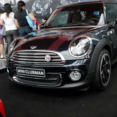 A MINI Clubman showcased at an auto event, demonstrating model reliability and how long do MINI Coopers last