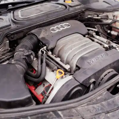 Open hood showing Audi V6 engine, used to explain are Audi expensive to maintain